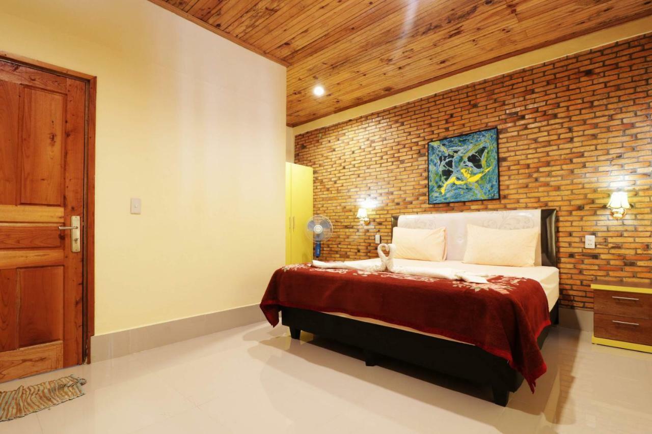 Tuk Tuk Timbul Bungalows Habitación foto